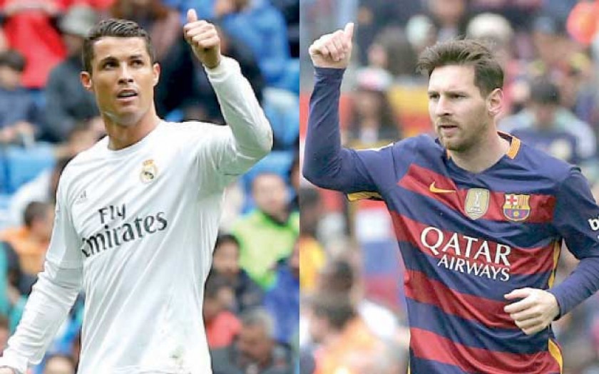 Cristiano Ronaldo (i) anotó en la victoria del Real Madrid, al igual que Lionel Messi para el Barcelona.