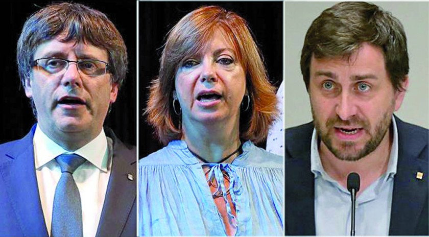 DESTITUIDOS. Carles Puigdemont, Meritxell Borràs y Antoni Comín, tres de las seis ex autoridades catalanas que...