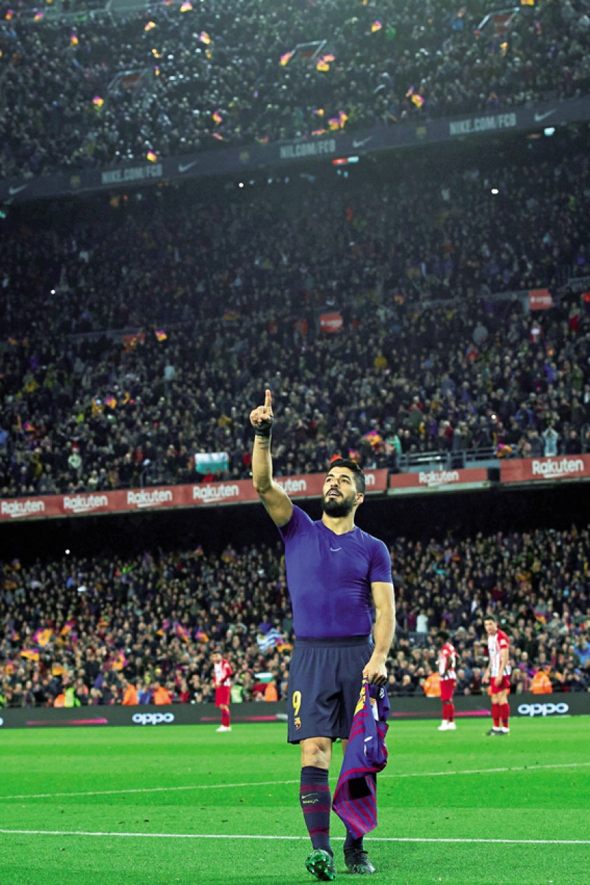 El uruguayo Luis Suárez abrió el camino del triunfo para el Barcelona ayer, frente al Atlético Madrid.