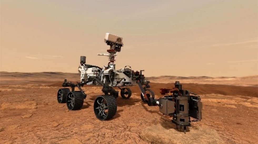 Una ilustración de la NASA muestra el rover Mars mientras usa su taladro para extraer una muestra de roca en Marte.