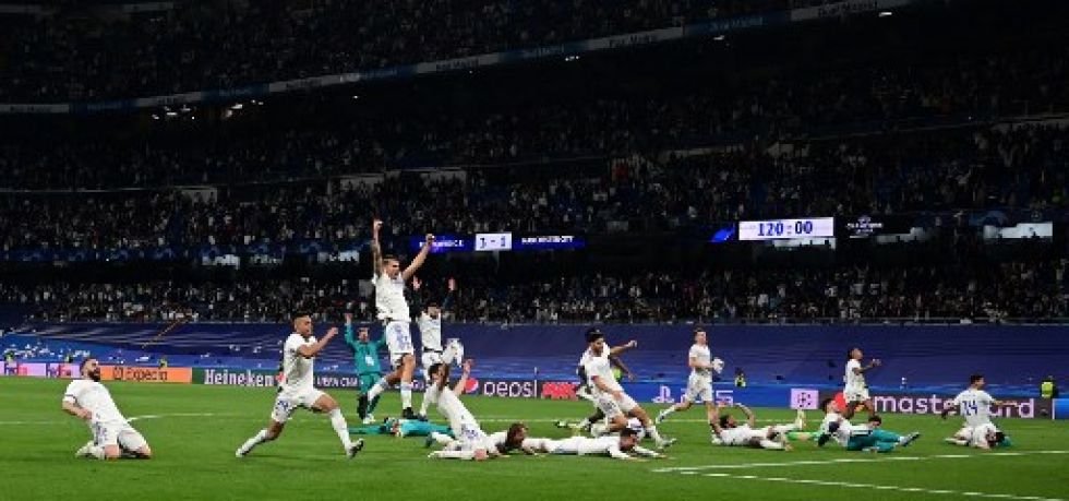 Los jugadores del Real Madrid celebran ganar el partido de vuelta de la semifinal de la Liga de Campeones de la UEFA entre el Real Madrid CF y el Manchester City, este miércoles.
