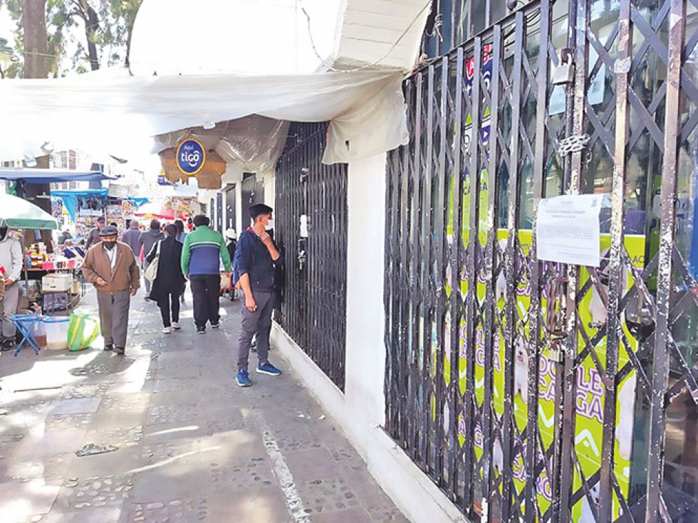 PRECINTADA. Las tiendas se abrirán cuando los deudores se acojan al plan de la Alcaldía.