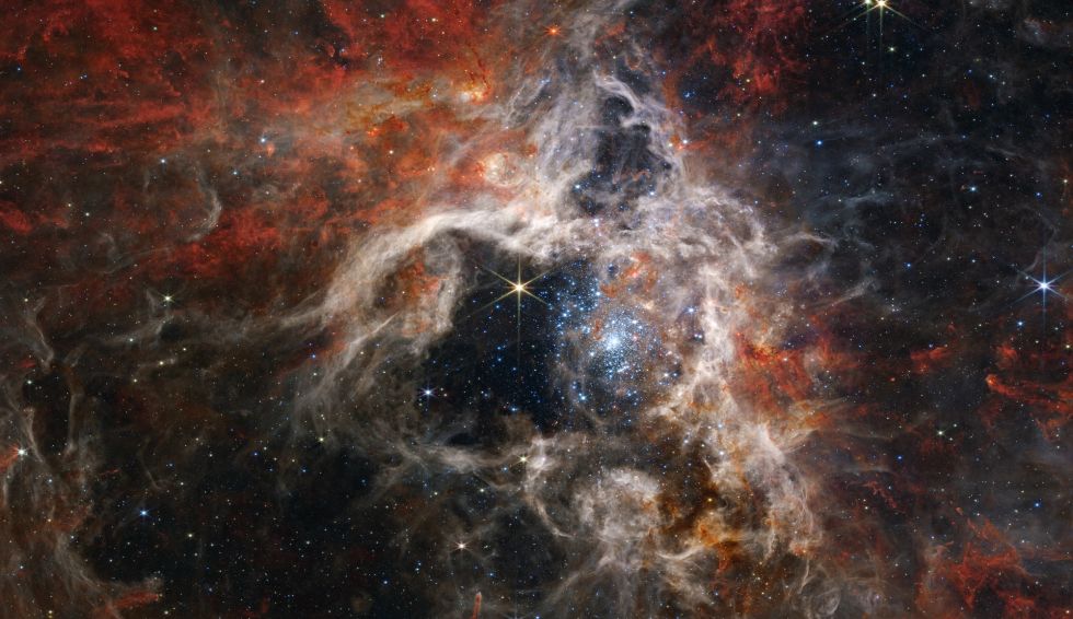 Región de formación de estrellas de la Nebulosa de la Tarántula. Crédito: NASA, ESA, CSA, STScI, equipo de producción de Webb ERO