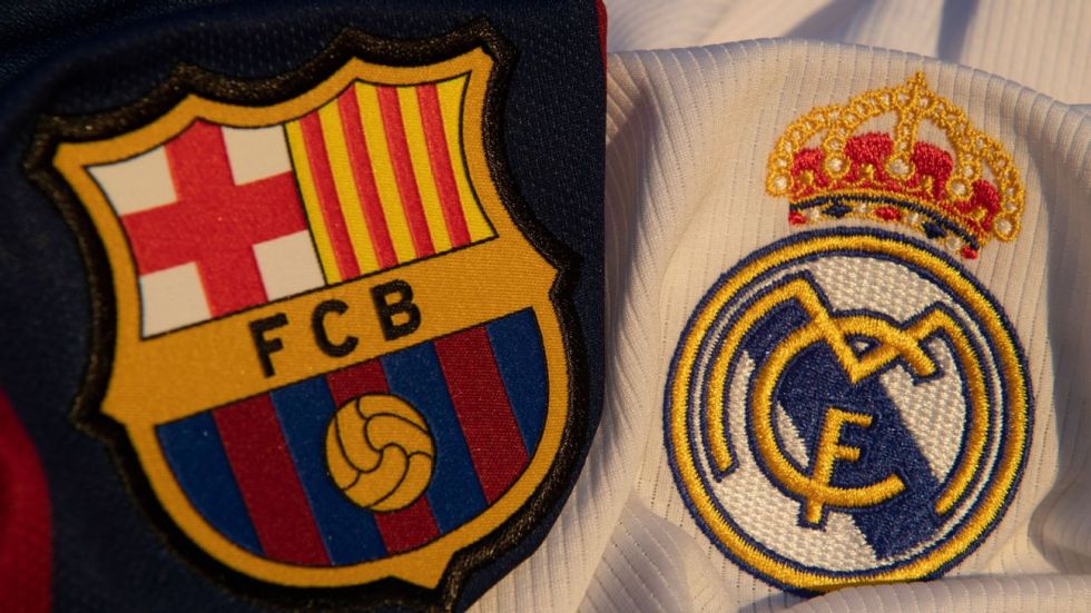Escudos del Barça y del Real Madird